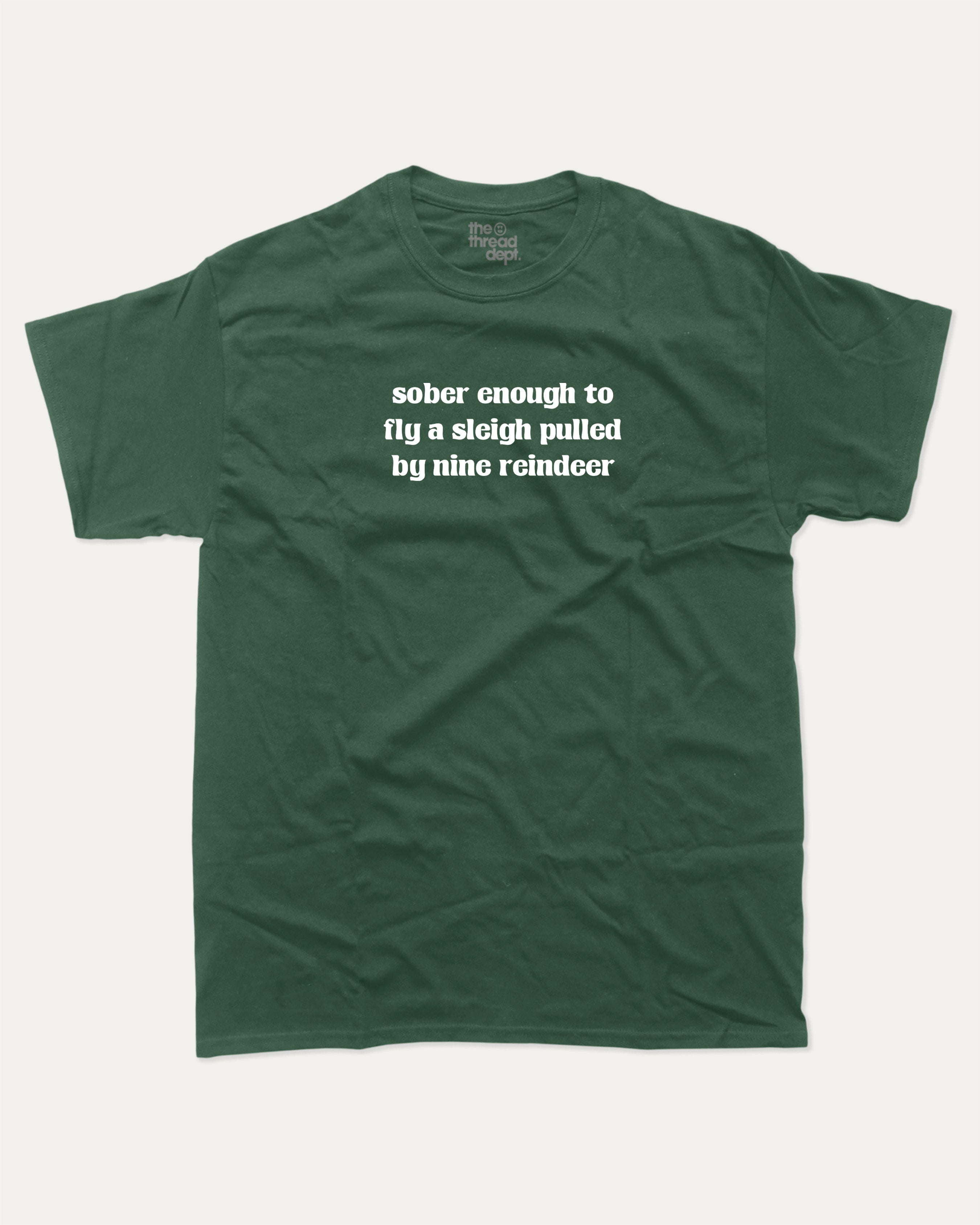 Sober Enough To Fly A Sleigh Pulled By Nine Reindeer graphic tee with bold and humorous print, Perfect Gift for Christmas, X-mas Gift,  funny and trendy graphic. Perfect for adults and gift-giving. Forest shirt.