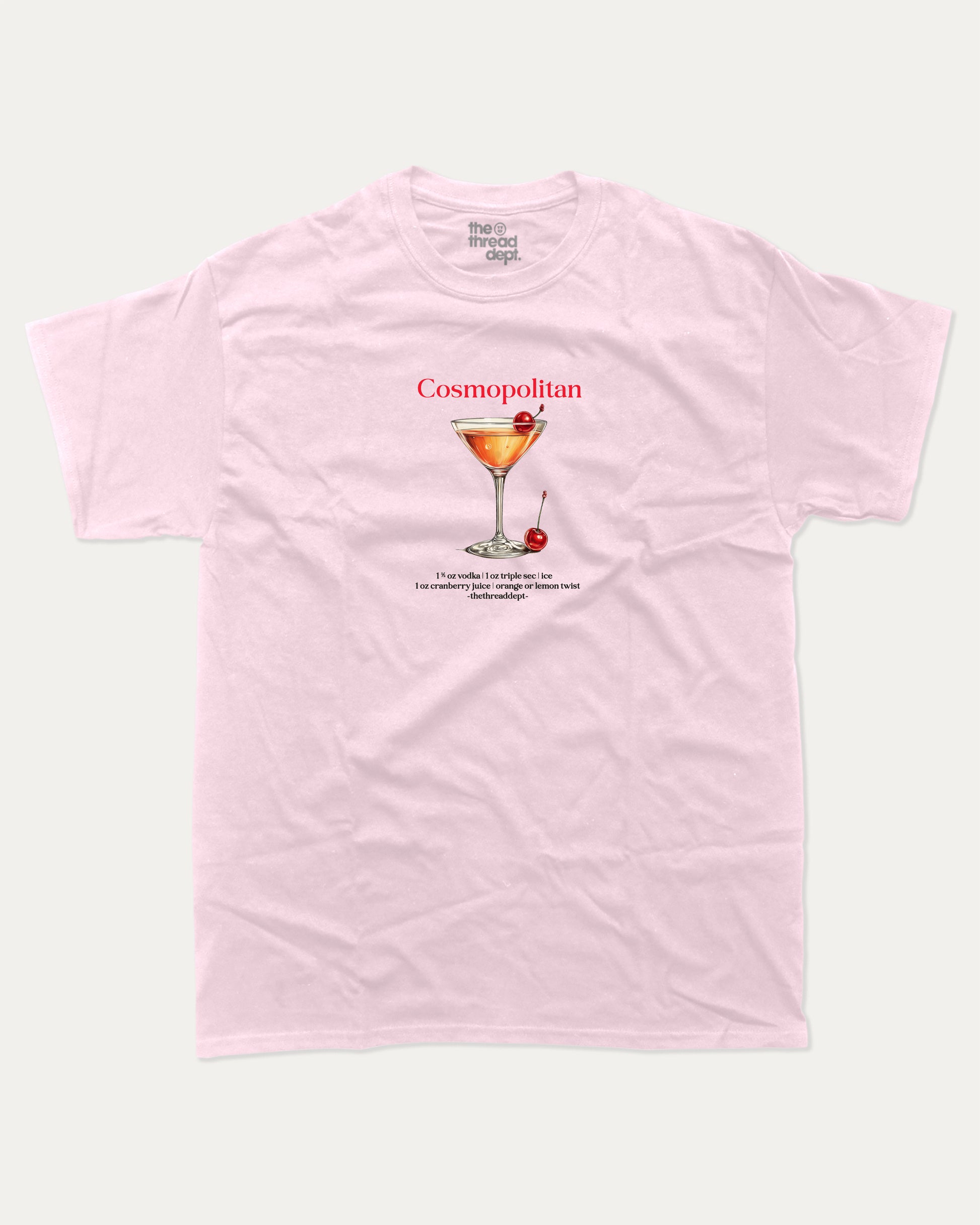 Pink t-shirt with a graphic of a cosmopolitan cocktail and text on a white background