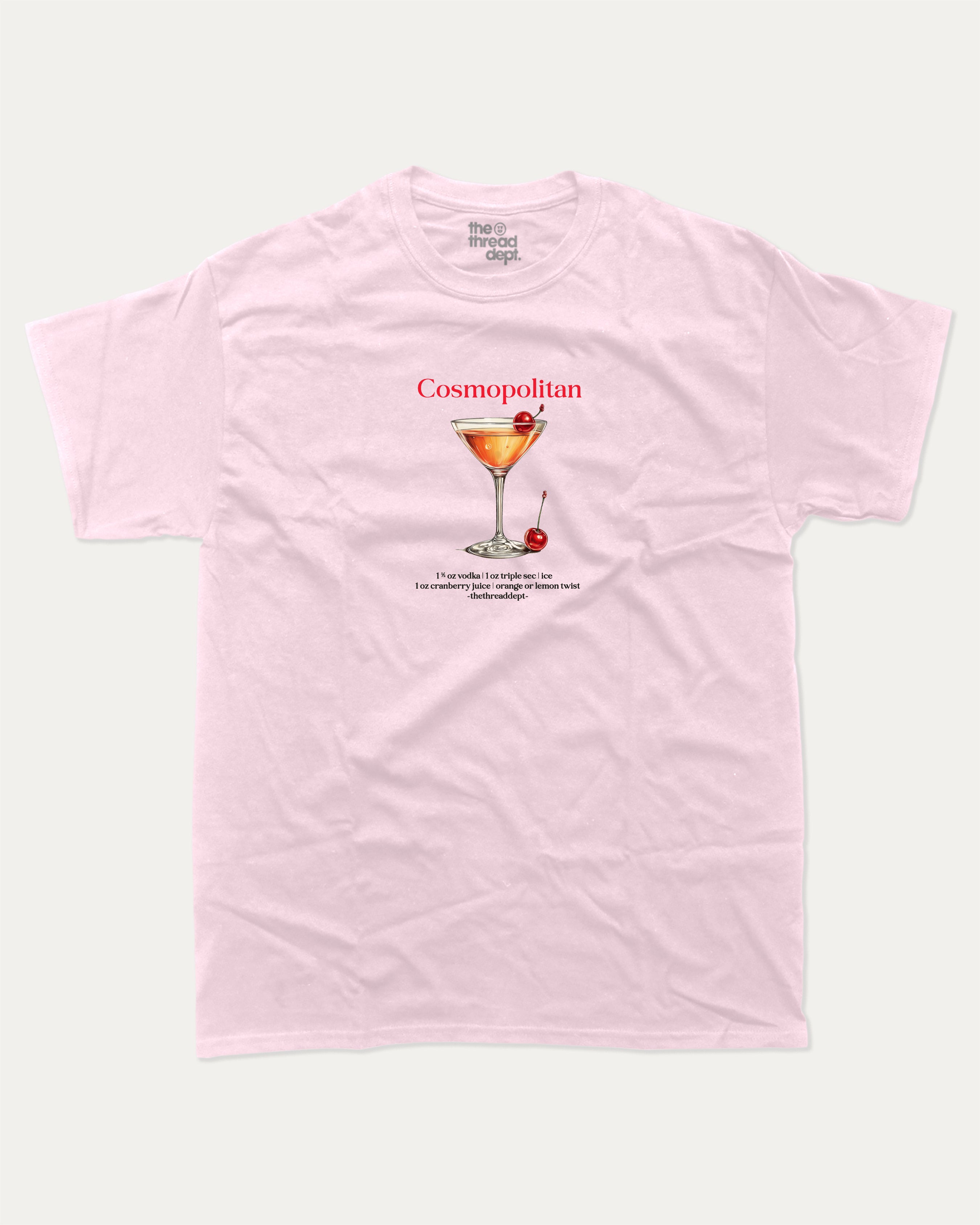 Pink t-shirt with a graphic of a cosmopolitan cocktail and text on a white background