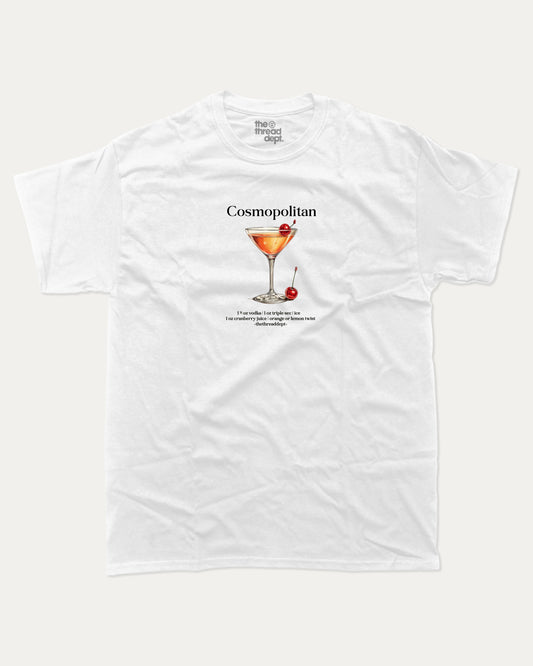 White t-shirt with a graphic of a cosmopolitan cocktail and text on a white background