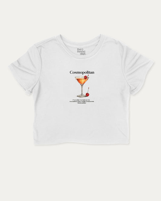 White t-shirt with a graphic of a cosmopolitan cocktail and text on a white background