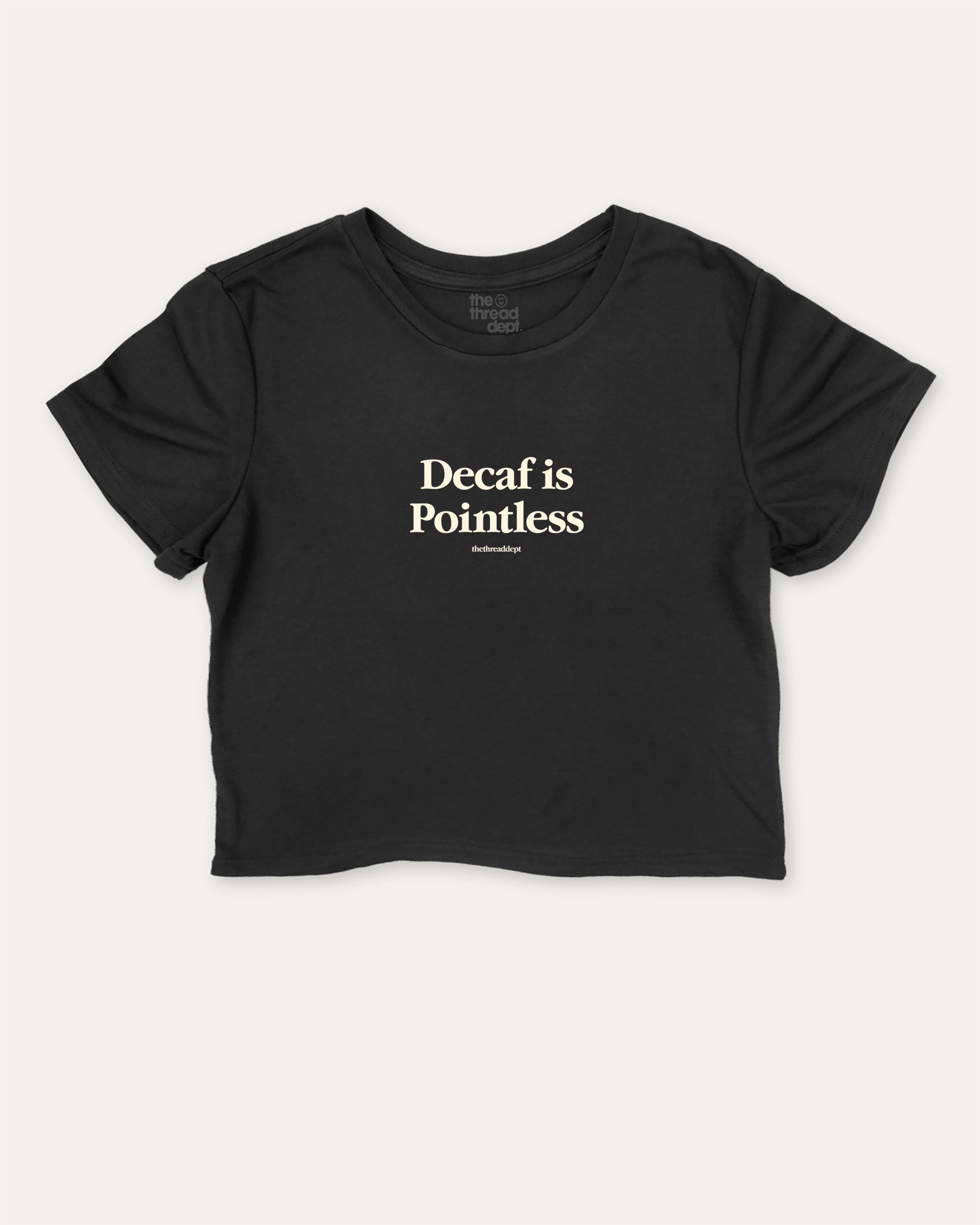 Decaf is Pointless graphic crop tee with funny and trendy slogan print, perfect for women’s casual looks or layering. Black crop t-shirt.