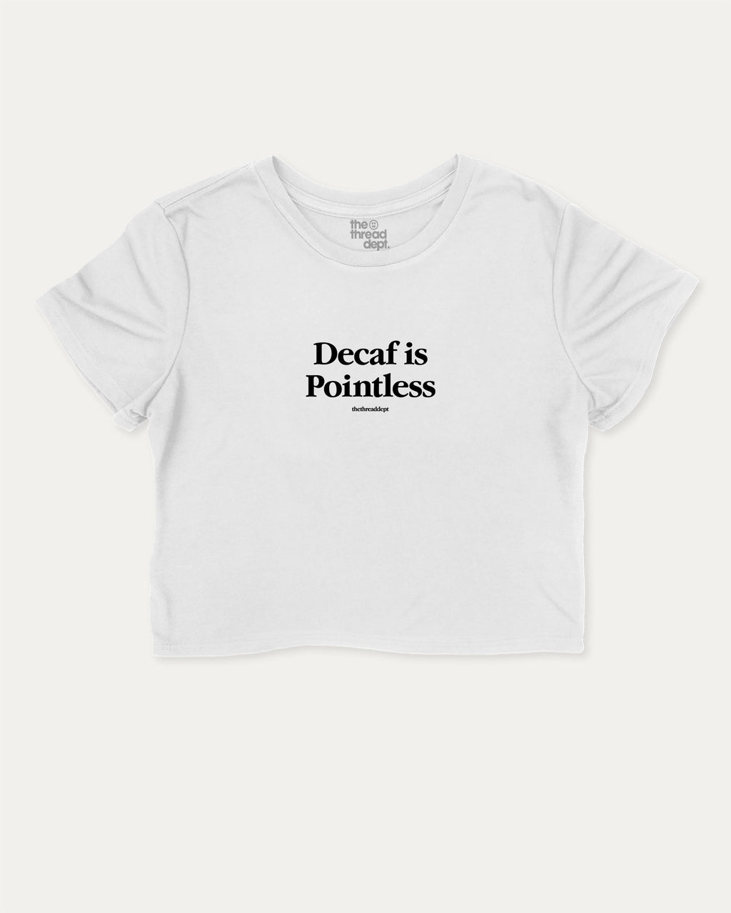 Decaf is Pointless graphic crop tee with funny and trendy slogan print, perfect for women’s casual looks or layering. White crop t-shirt.