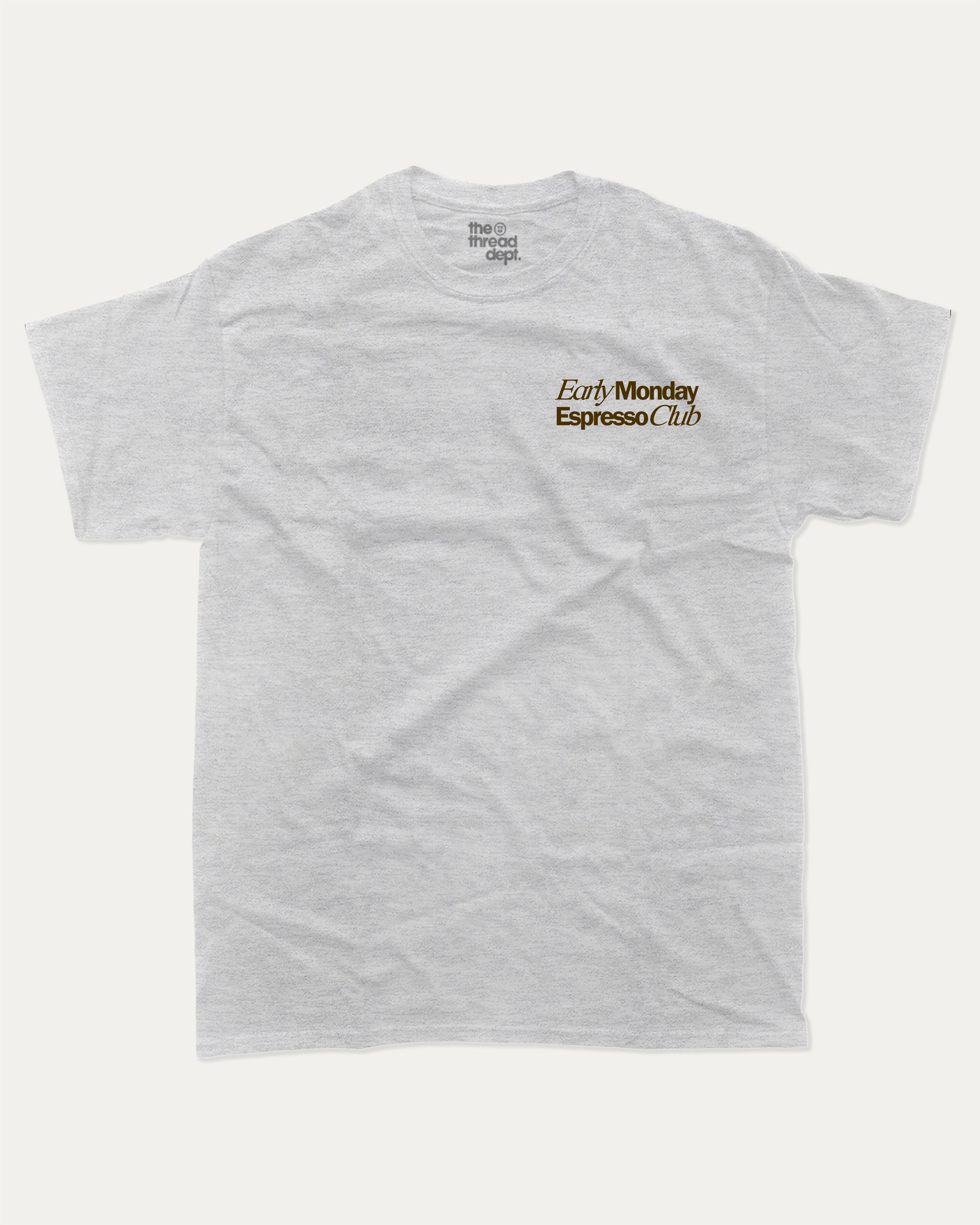 Early Monday Espresso Club graphic tee with bold and humorous print, funny and trendy graphic. Gift for Coffee Lover, Cofee Graphic Tee. Perfect for adults and gift-giving. Ash Grey shirt.