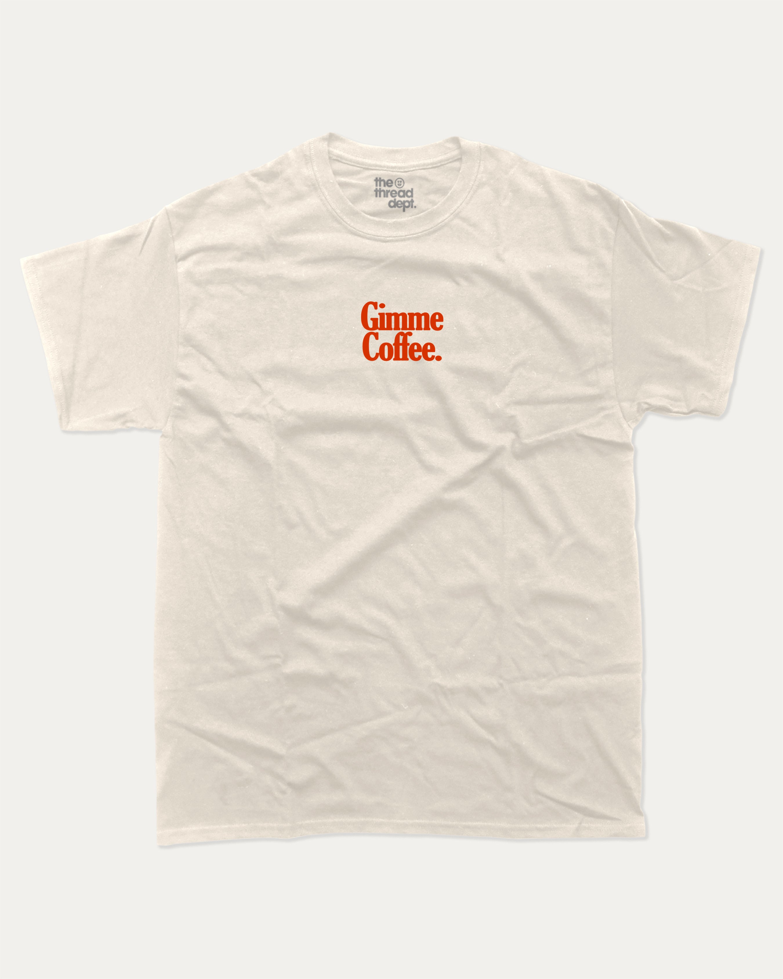 Gimme Coffee graphic tee with bold and humorous print, funny and trendy graphic. Coffee Lover Graphic T shirt, Caffeine Lover Graphic T shirt,  Perfect for adults and gift-giving. Cream shirt.