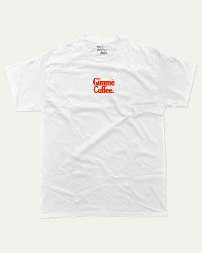 Gimme Coffee graphic tee with bold and humorous print, funny and trendy graphic. Coffee Lover Graphic T shirt, Caffeine Lover Graphic T shirt,  Perfect for adults and gift-giving. White shirt.