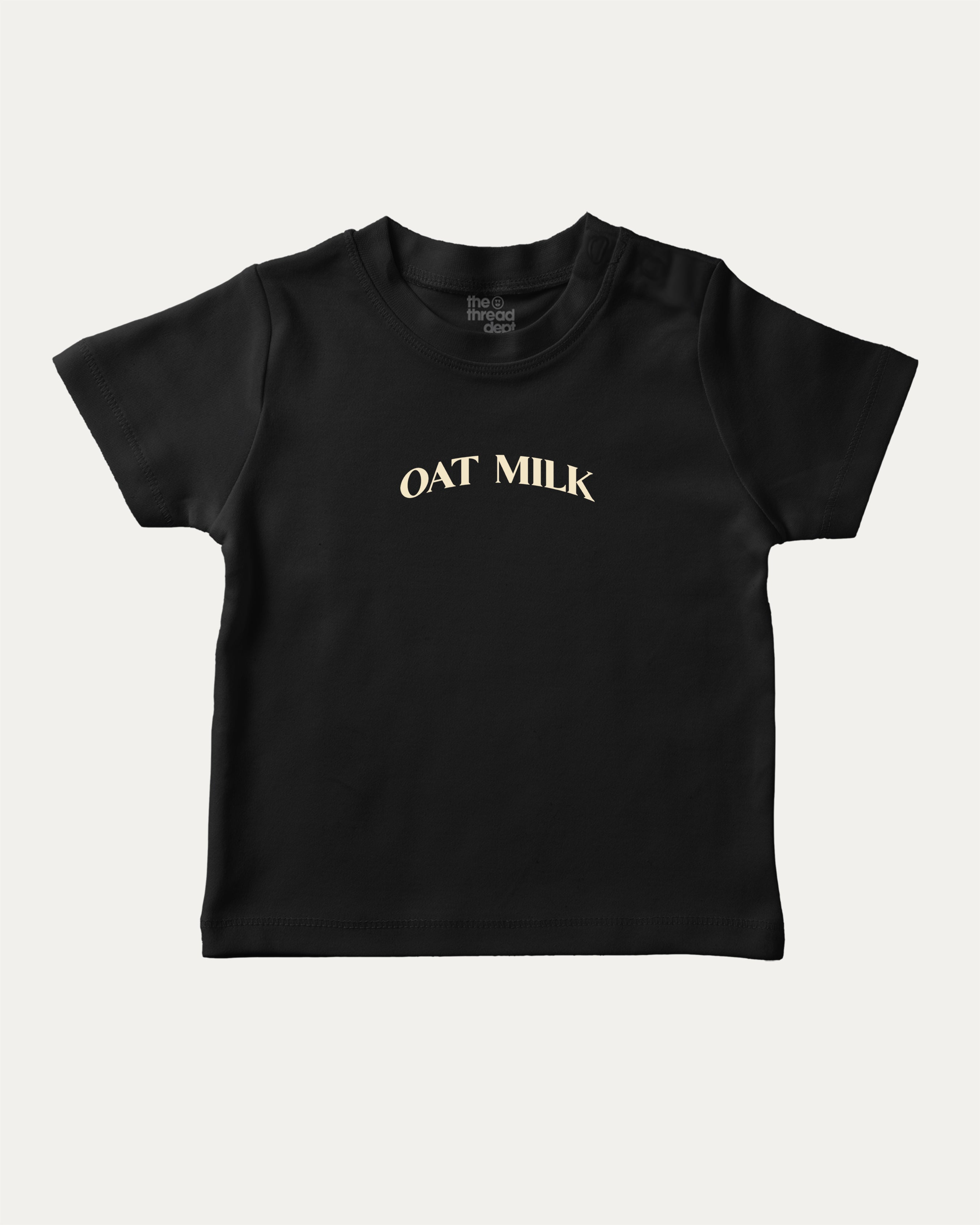 Oat Milk graphic t-shirt with bold and humorous print, funny and trendy graphic. Perfect funny gifts for friends. Black shirt.