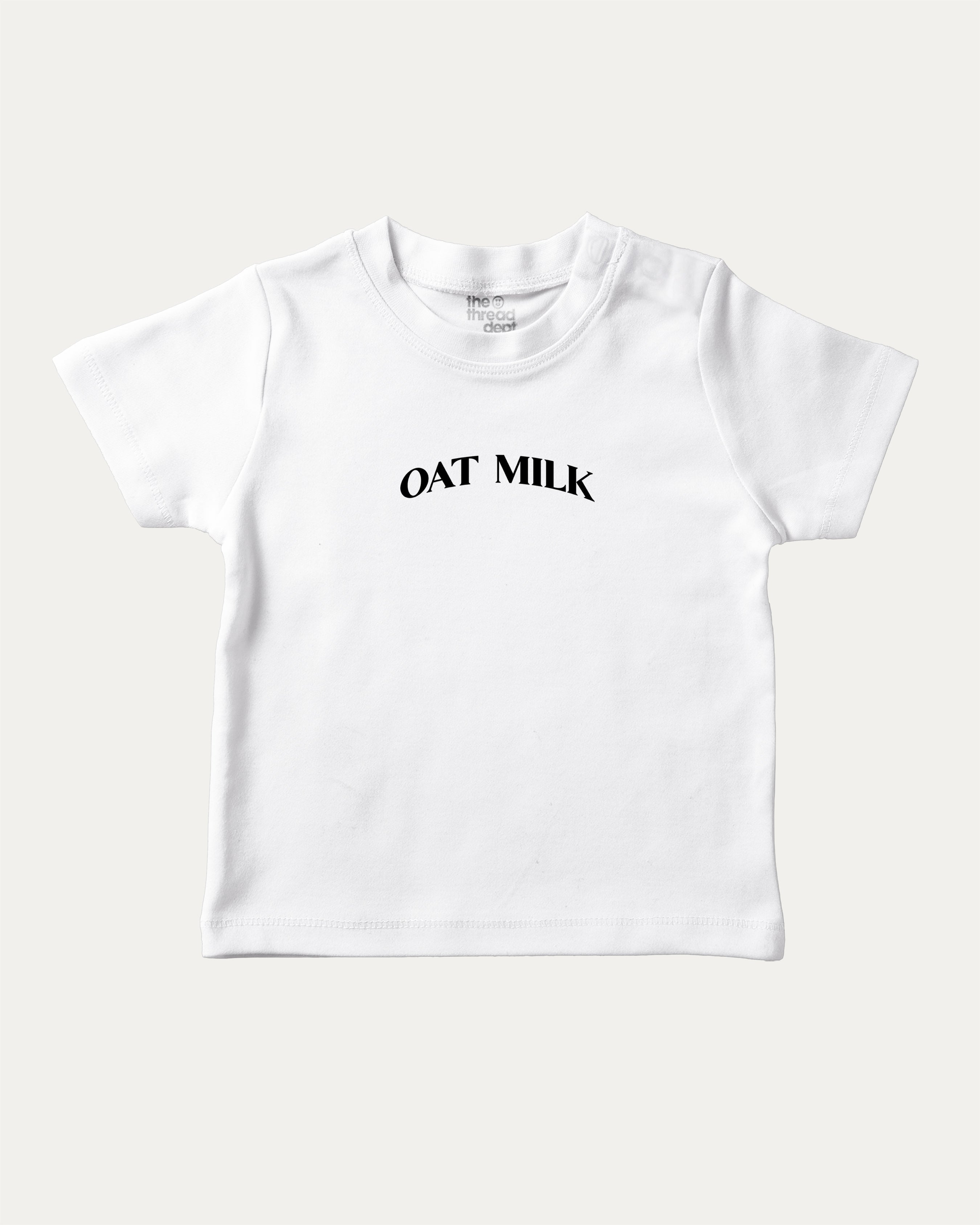 Oat Milk graphic t-shirt with bold and humorous print, funny and trendy graphic. Perfect funny gifts for friends. White shirt.
