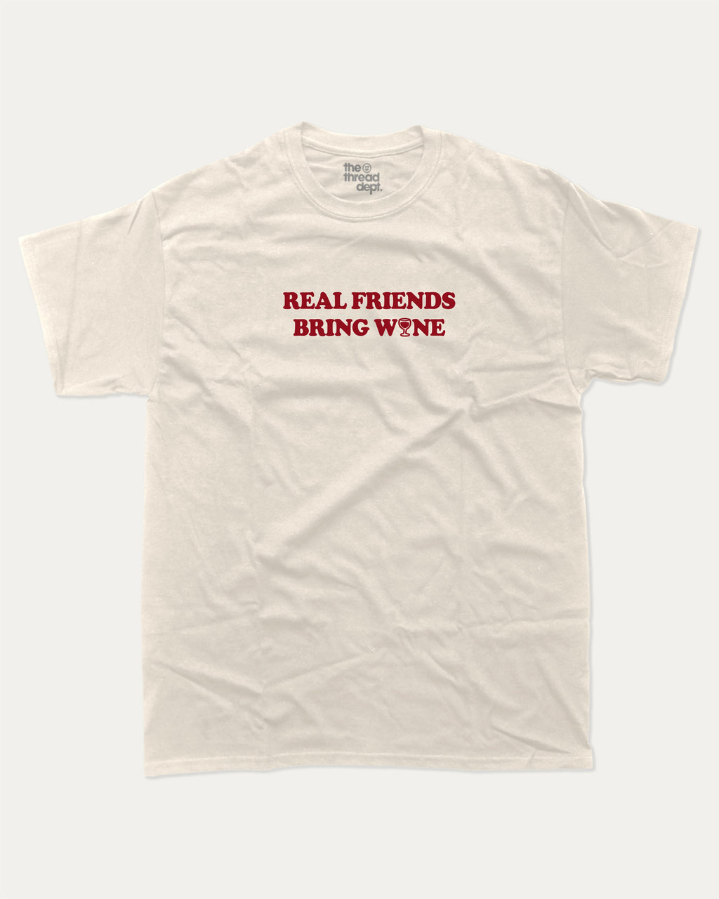 Real Friends Bring wine graphic tee with bold and humorous print, Perfect T shirt for Wine Lover, Wine Graphic T shirt, funny and trendy graphic. Perfect for adults and gift-giving. Cream shirt.
