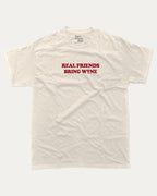 Real Friends Bring wine graphic tee with bold and humorous print, Perfect T shirt for Wine Lover, Wine Graphic T shirt, funny and trendy graphic. Perfect for adults and gift-giving. Cream shirt.
