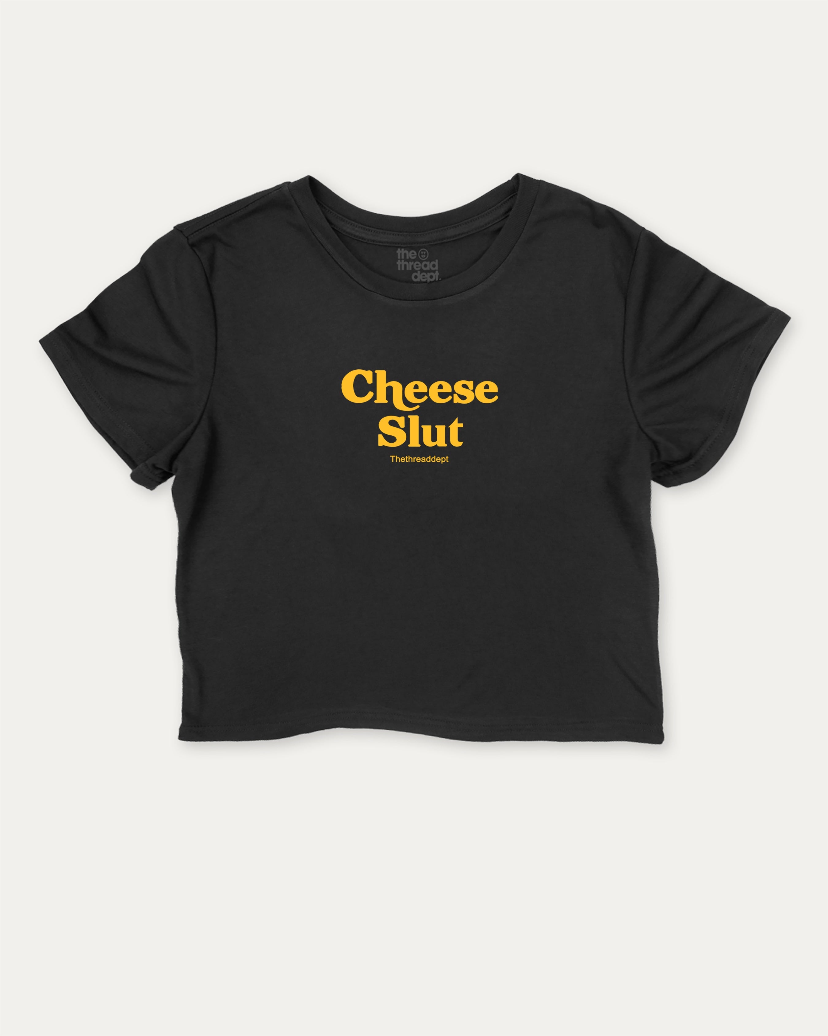 Cheese Slut graphic crop tee with cheese slogan print, perfect for women_ casual looks or layering. Black crop t-shirt.