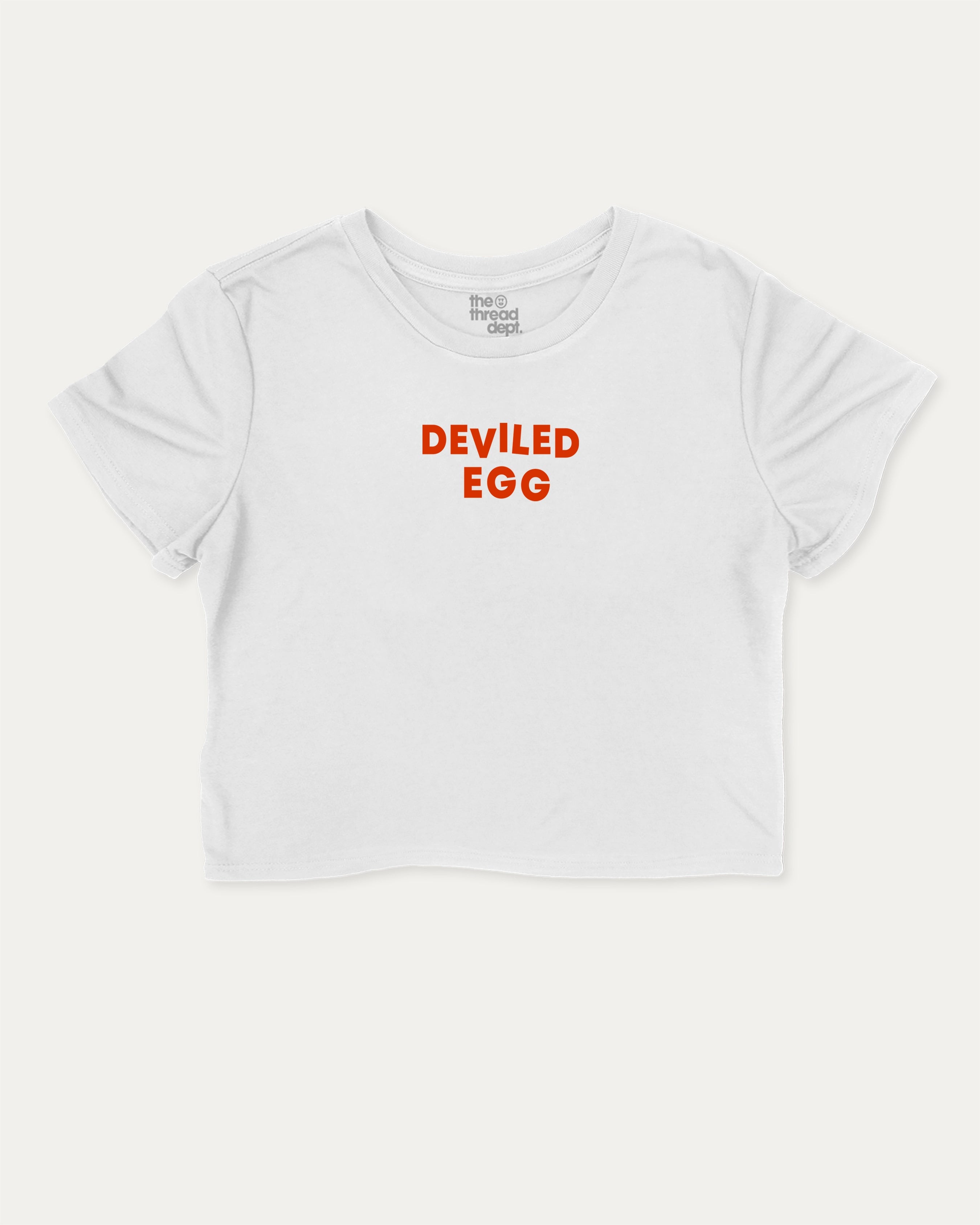Deviled Egg graphic crop tee with funny and trendy slogan print, perfect for women_ casual looks or layering. Food Lover T shirt, Craving Graphic Tee, White crop t-shirt.