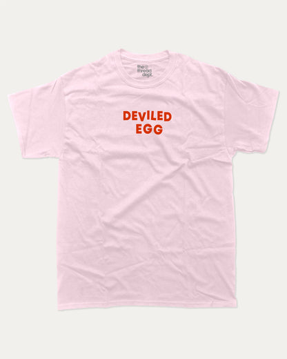 Deviled Egg graphic tee with bold and humorous print, funny and trendy graphic. Food Lover T shirt, Craving Graphic Tee,  Perfect for adults and gift-giving. Pink shirt.