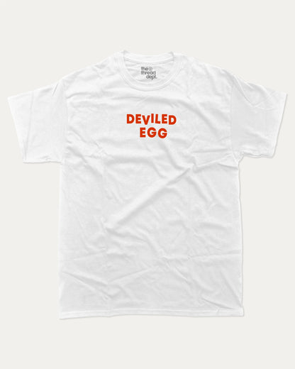 Deviled Egg graphic tee with bold and humorous print, funny and trendy graphic. Food Lover T shirt, Craving Graphic Tee,  Perfect for adults and gift-giving. White shirt.
