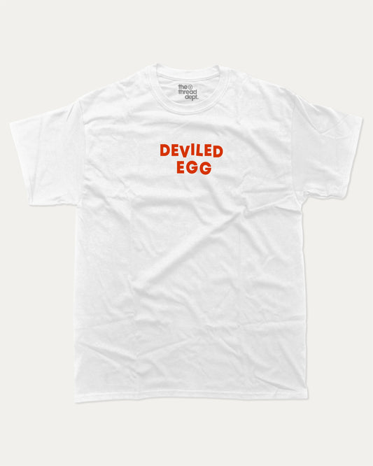 Deviled Egg graphic tee with bold and humorous print, funny and trendy graphic. Food Lover T shirt, Craving Graphic Tee,  Perfect for adults and gift-giving. White shirt.