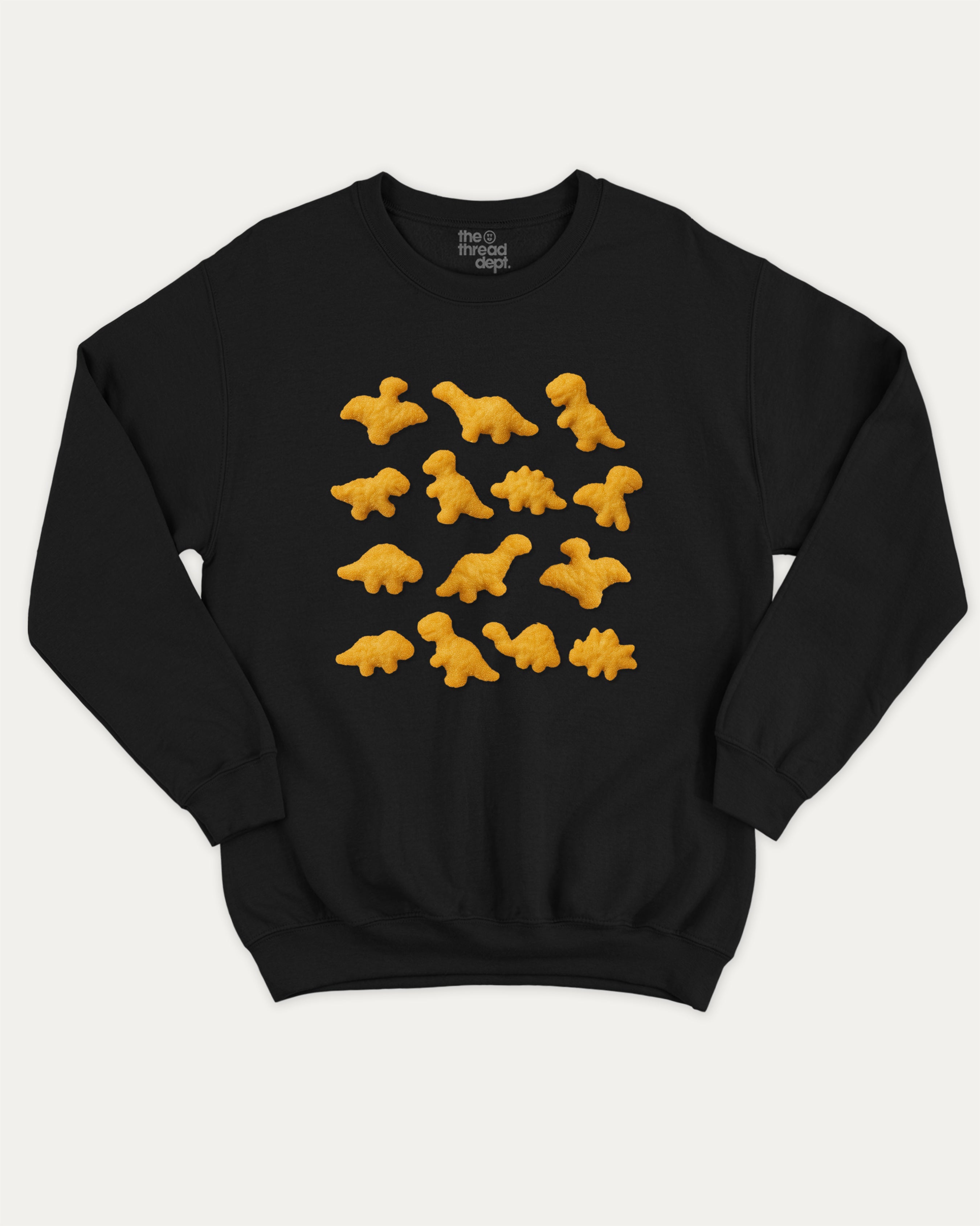 Dino Nugget graphic sweatshirt with bold and humorous print, warm and cozy graphic for everyday wear. Perfect for adults and gift-giving. Black pullover.