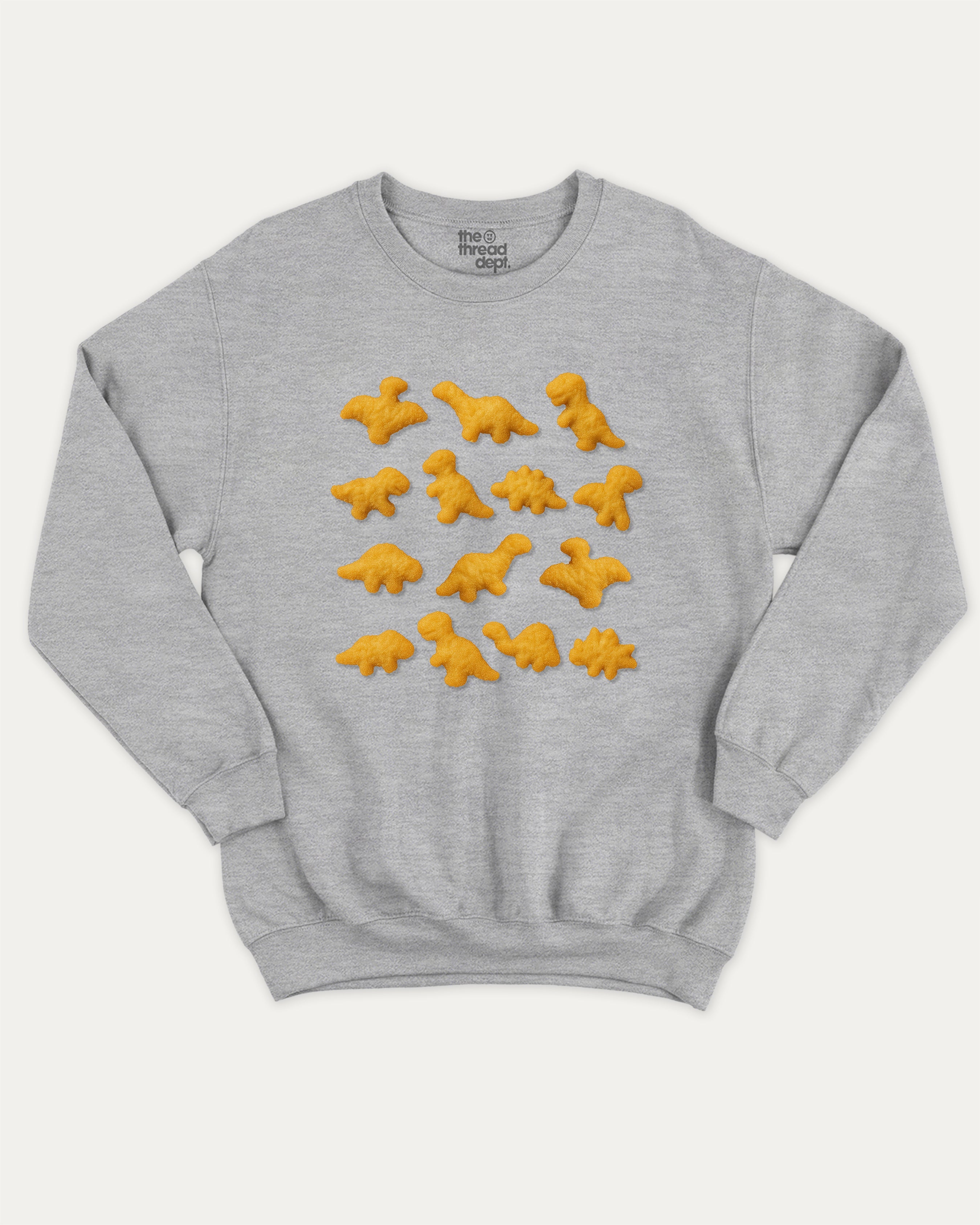 Dino Nugget graphic sweatshirt with bold and humorous print, warm and cozy graphic for everyday wear. Perfect for adults and gift-giving. Heather Grey pullover.