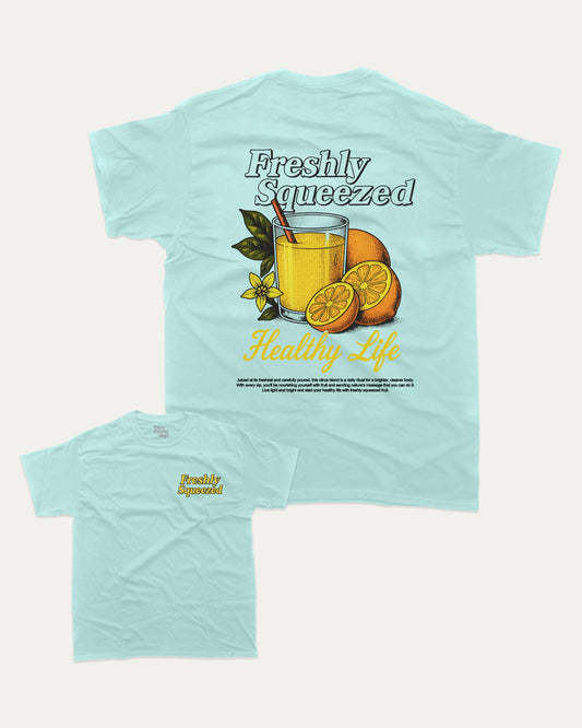Freshly Squeezed Lemon graphic t-shirt, perfect for adults. Vintage lemon graphic tee, trending meme shirt, unique gift idea. Celadon.