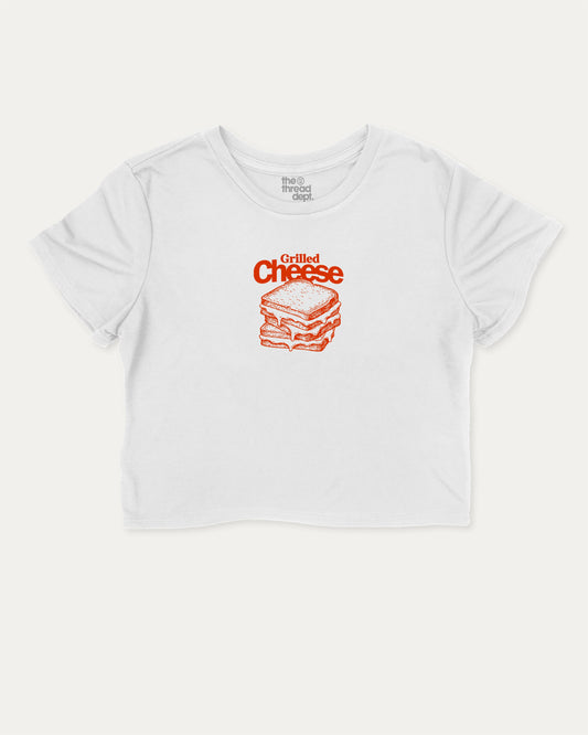 Grilled Cheese graphic crop tee with funny and trendy slogan print, perfect for women’s casual looks or layering. White crop t-shirt.
