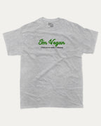 I'm Vegan graphic tee with bold and humorous print, Vegan Graphic T shirt, Funny Vegan T shirt, Perfect Gift for Vegeterians, Vegeterian Graphic T shirt, funny and trendy graphic. Perfect for adults and gift-giving. Heather Grey shirt.