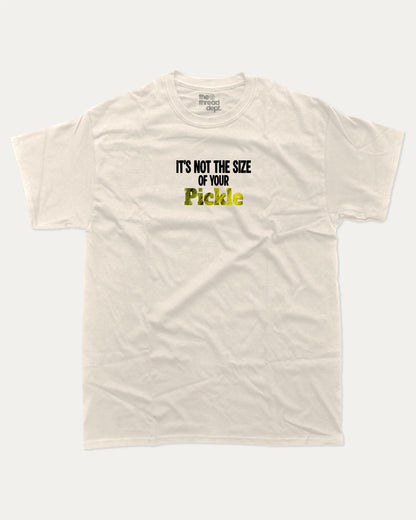 It's not the size of your pickle graphic tee with bold and humorous print, Pickle Lover Graphic T shirt, Perfect Gift for Pickle Lover,  funny and trendy graphic. Perfect for adults and gift-giving. Cream shirt.
