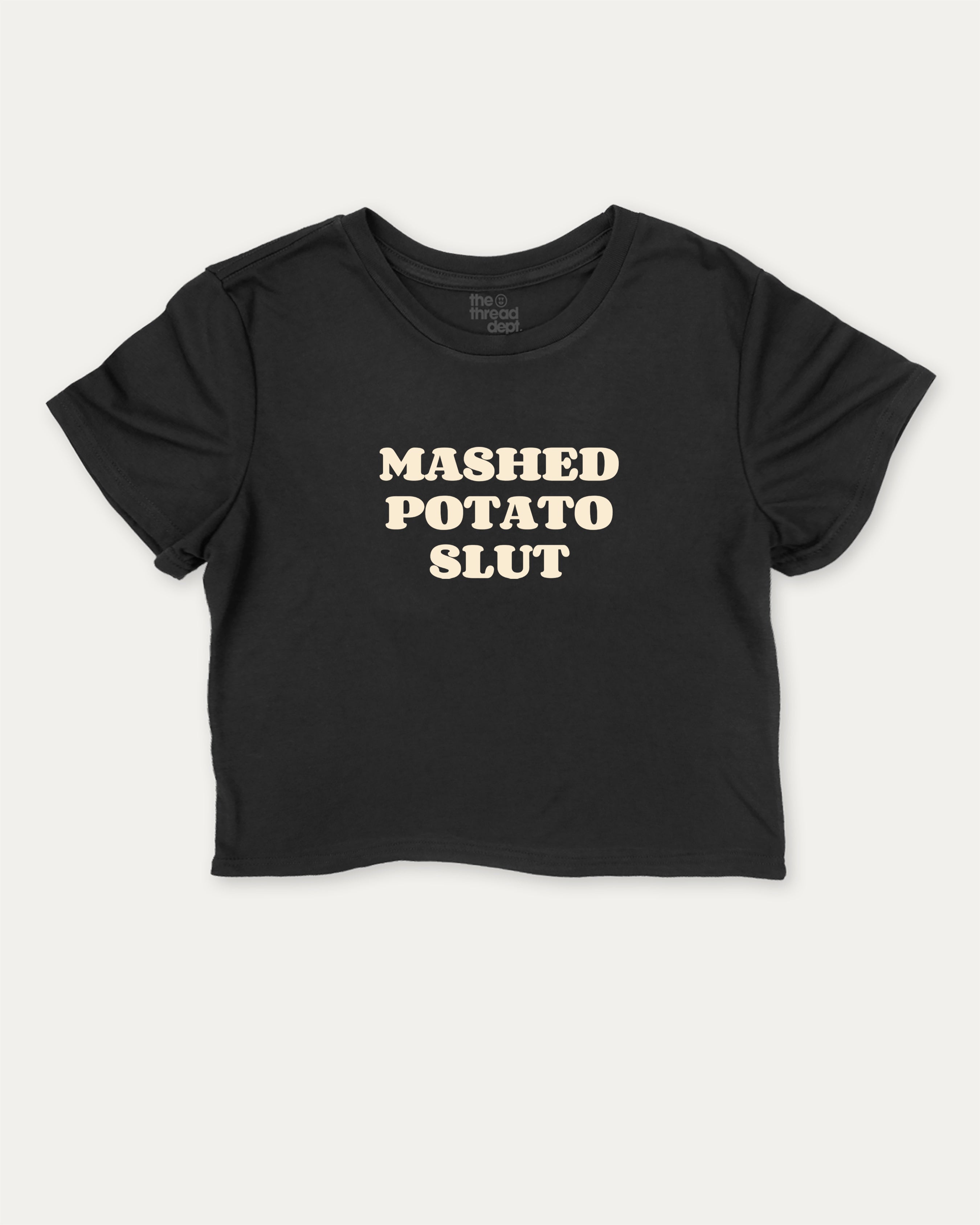 Mashed Potato Slut graphic crop tee with funny and trendy slogan print, perfect for women_ casual looks or layering. Black crop t-shirt.