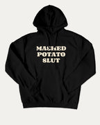 Mashed Potato Slut graphic hoodie with funny and trendy artwork, casual streetwear with bold personality. Great for adults and gifting. Black hoodie.