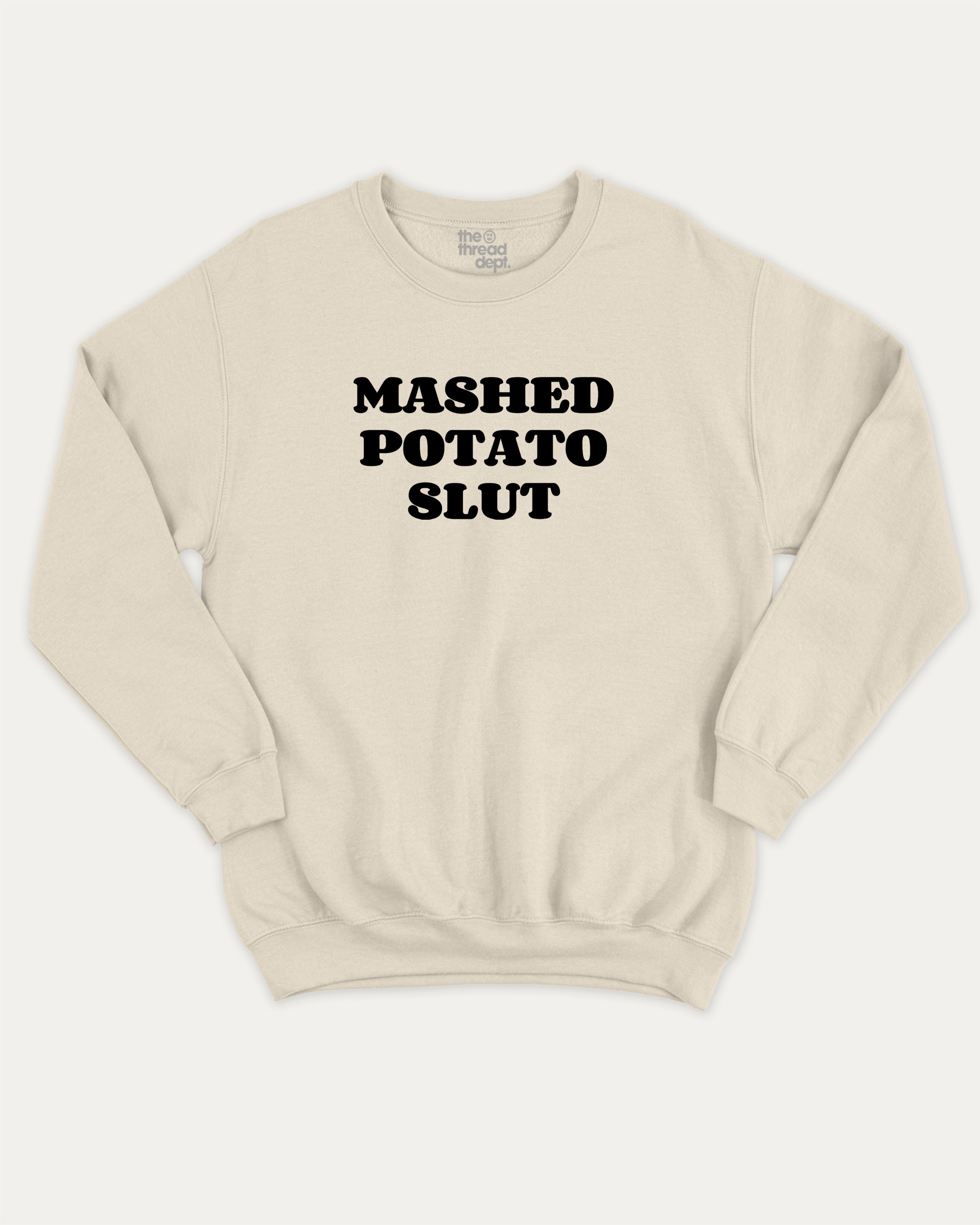 Mashed Potato Slut graphic sweatshirt with bold and humorous print, warm and cozy graphic for everyday wear. Perfect for adults and gift-giving. Natural pullover.