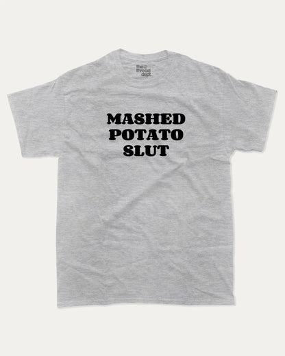 Mashed Potato Slut graphic tee with bold and humorous print, retro mashed potato graphic. Perfect for adults and gift-giving. Heather Grey shirt.