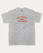 Most Valuable Snack Coordinator graphic tee with bold and humorous print, funny and trendy graphic. Food Lover Graphic T shirt, Snack Lover T shirt, Perfect for adults and gift-giving. Heather Grey shirt.