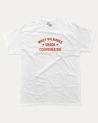 Most Valuable Snack Coordinator graphic tee with bold and humorous print, funny and trendy graphic. Food Lover Graphic T shirt, Snack Lover T shirt, Perfect for adults and gift-giving. White shirt.