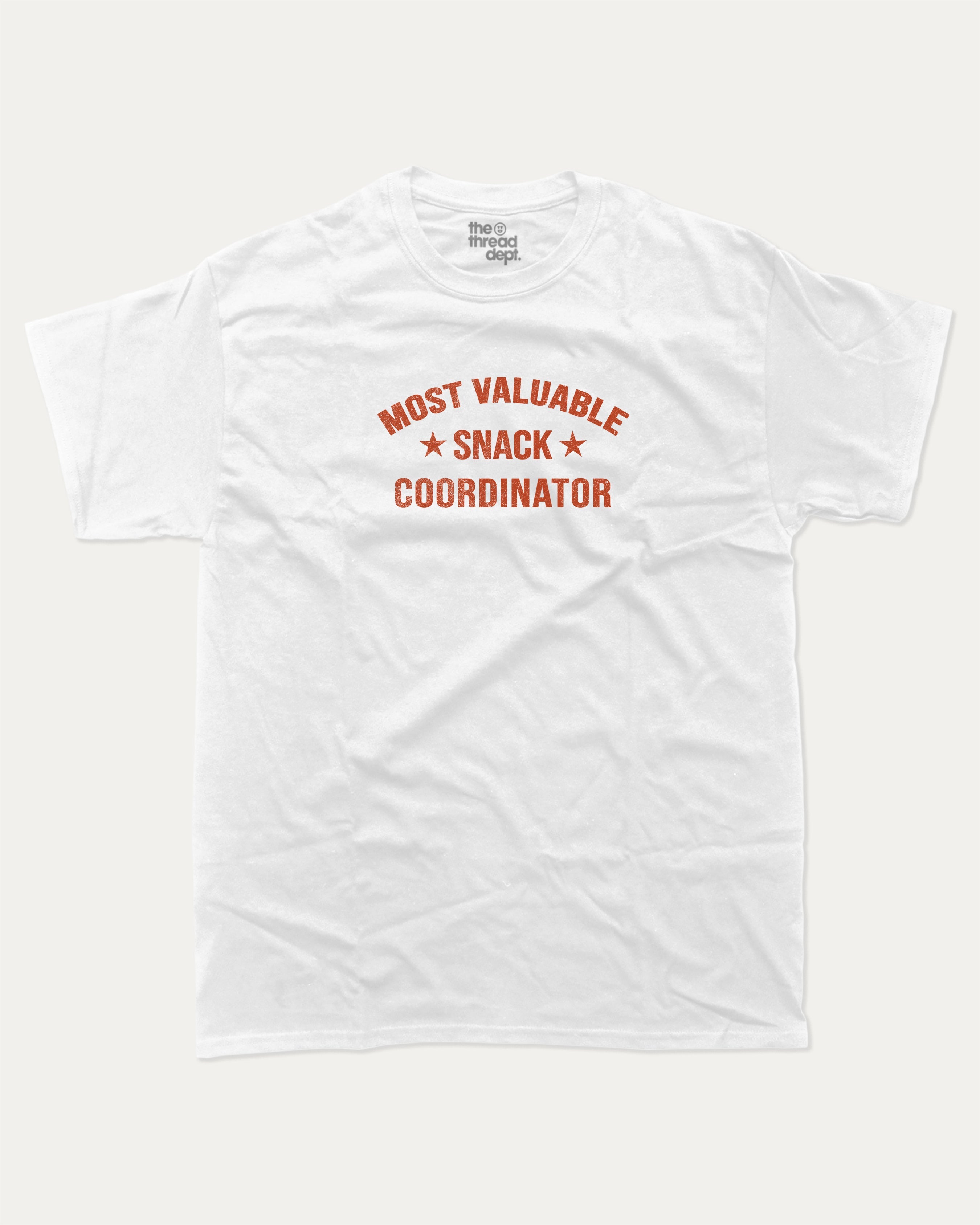 Most Valuable Snack Coordinator graphic tee with bold and humorous print, funny and trendy graphic. Food Lover Graphic T shirt, Snack Lover T shirt, Perfect for adults and gift-giving. White shirt.