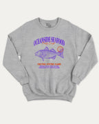 Oceanside Seafood graphic sweatshirt with bold and humorous print, Food Graphic Tee, Seafood Lover, Retro Inspired Graphic T shirt, Cute Retro Vintage Graphic T shirt, warm and cozy graphic for everyday wear. Perfect for adults and gift-giving. Heather Grey pullover.