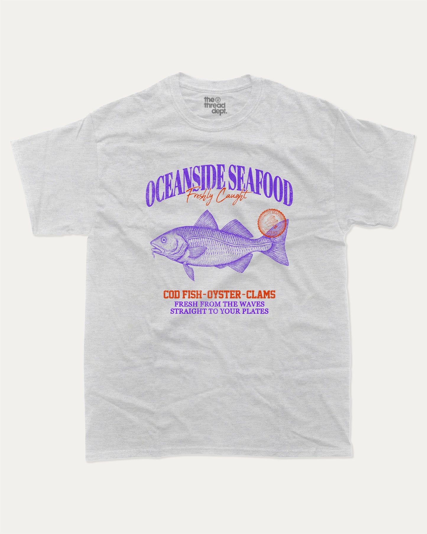 Oceanside Seafood graphic tee with bold and humorous print, Food Graphic Tee, Seafood Lover, Retro Inspired Graphic T shirt, Cute Retro Vintage Graphic T shirt, funny and trendy graphic. Perfect for adults and gift-giving. Ash Grey shirt.