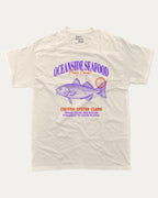 Oceanside Seafood graphic tee with bold and humorous print, Food Graphic Tee, Seafood Lover, Retro Inspired Graphic T shirt, Cute Retro Vintage Graphic T shirt, funny and trendy graphic. Perfect for adults and gift-giving. Cream shirt.