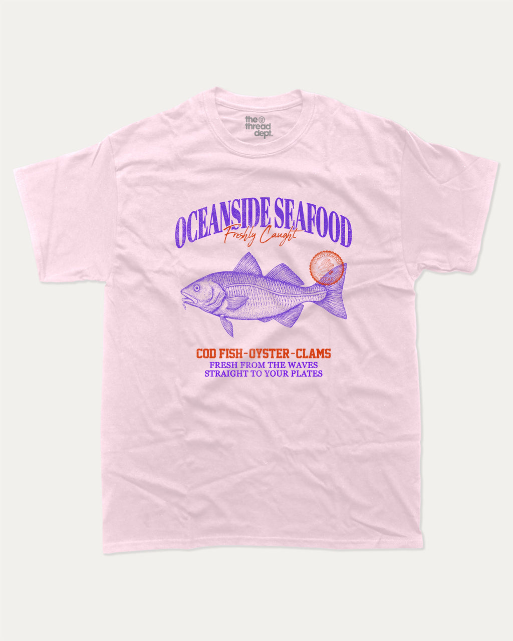 Oceanside Seafood graphic tee with bold and humorous print, Food Graphic Tee, Seafood Lover, Retro Inspired Graphic T shirt, Cute Retro Vintage Graphic T shirt, funny and trendy graphic. Perfect for adults and gift-giving. Pink shirt.