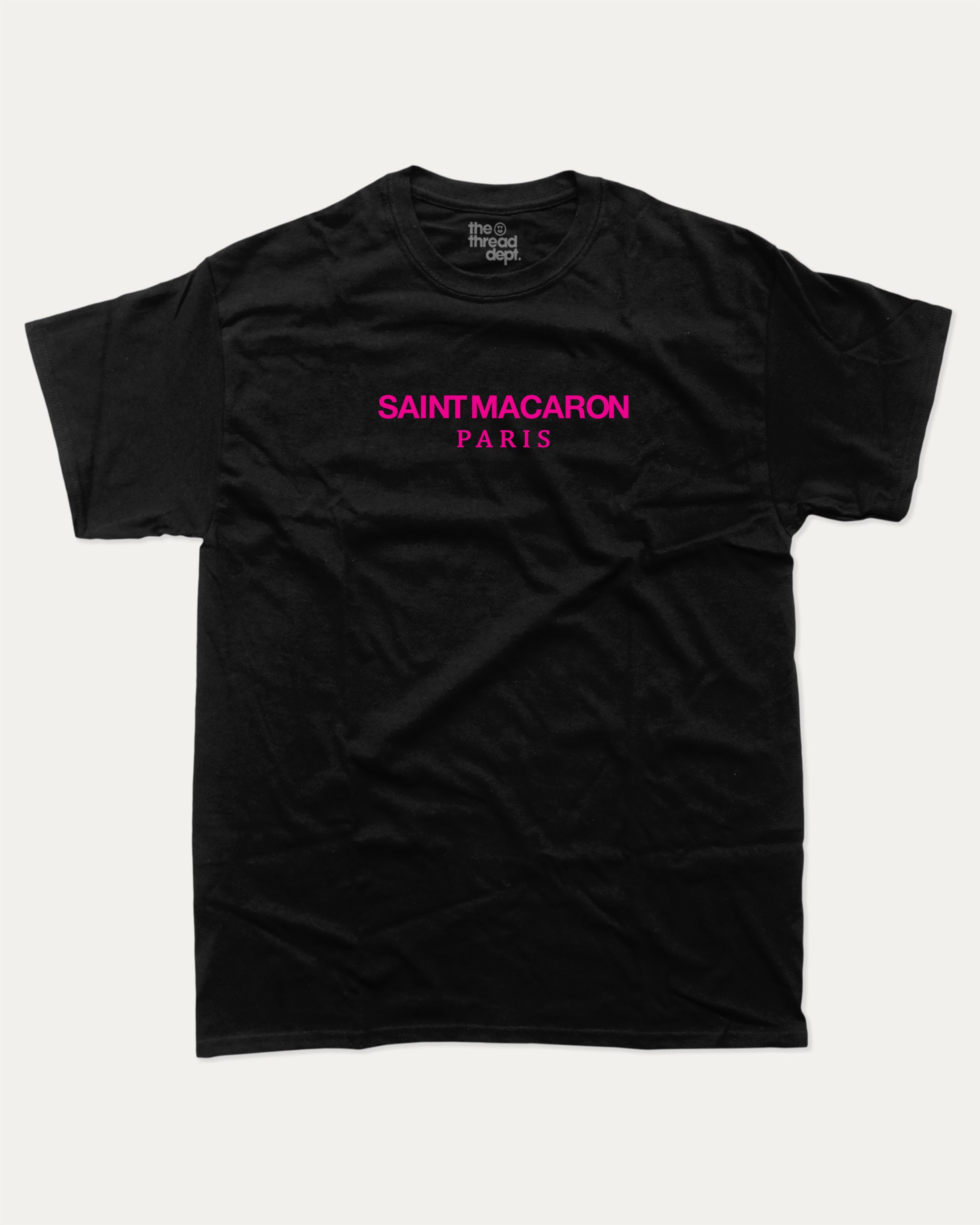 Saint Macaron graphic tee with bold and humorous print, funny and trendy graphic. Food Lover Graphic T shirt, Snack Lover T shirt, Perfect for adults and gift-giving. Black shirt.