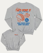 Taco bout it graphic sweatshirt with bold and humorous print, Perfect Gift for Taco Lovers, Taco Graphic T shirt, Vintage Taco T shirt, Vintage Taco Back Print T shirt, warm and cozy graphic for everyday wear. Perfect for adults and gift-giving. Heather Grey pullover.
