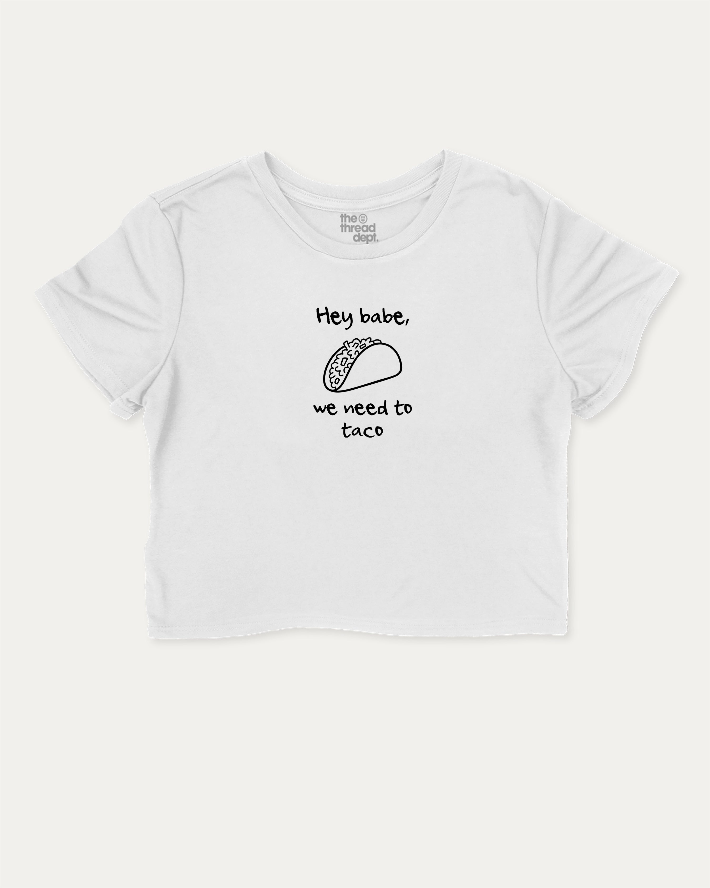We need to taco cute and trendy crop tee with nostalgic graphic, perfect for women. A must-have cropped aesthetic shirt, ideal for daily outfits and casual days. White crop tee