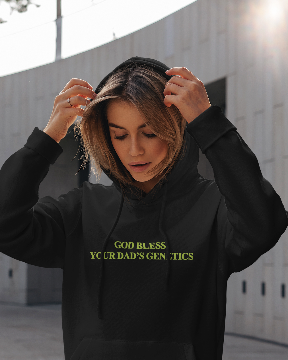 God Bless Your Dad's Genetics graphic hoodie with retro and trendy artwork, casual streetwear with bold personality. Great for adults and gifting. Black hoodie.