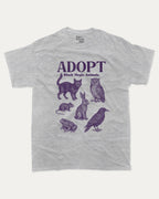 Adopt Black Magic Animals graphic tee with bold and humorous print, Perfect Gift for Halloween Day, Halloween Day Graphic T shirt,  funny and trendy graphic. Perfect for adults and gift-giving. Heather Grey shirt.