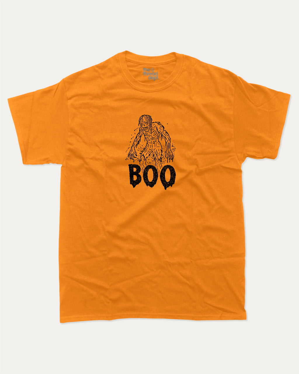 Boo Zombie graphic t-shirt with vintage zombie print, funny and trendy graphic. Perfect funny Halloween gifts for friends and family. Orange shirt.