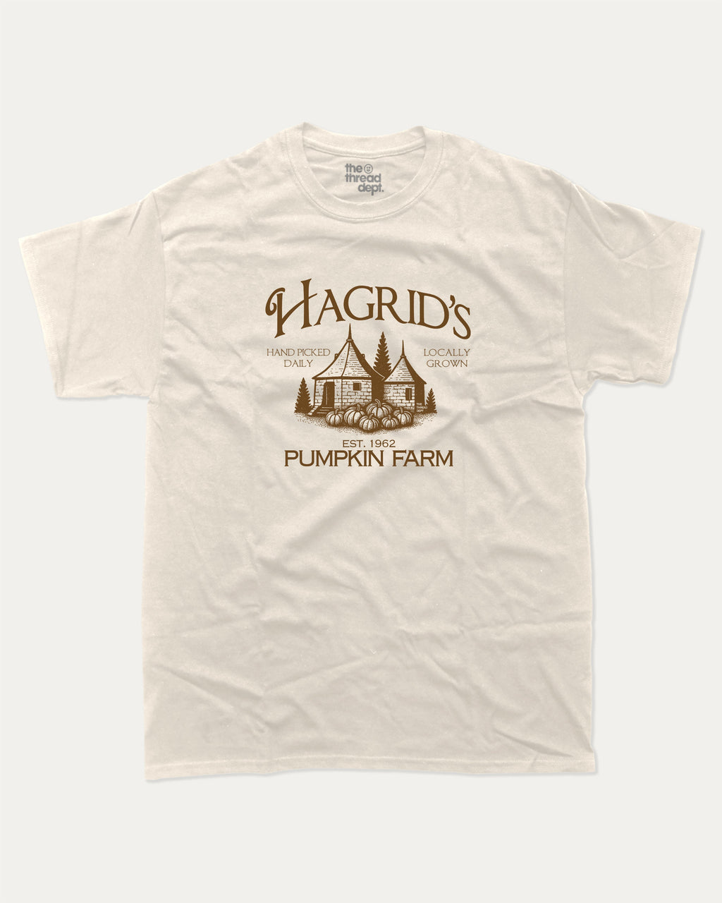 Hagrid's Pumpkin Farm graphic t-shirt, perfect halloween gift for friends. Vintage halloween tee, halloween graphic shirt, unique gift idea. Cream.