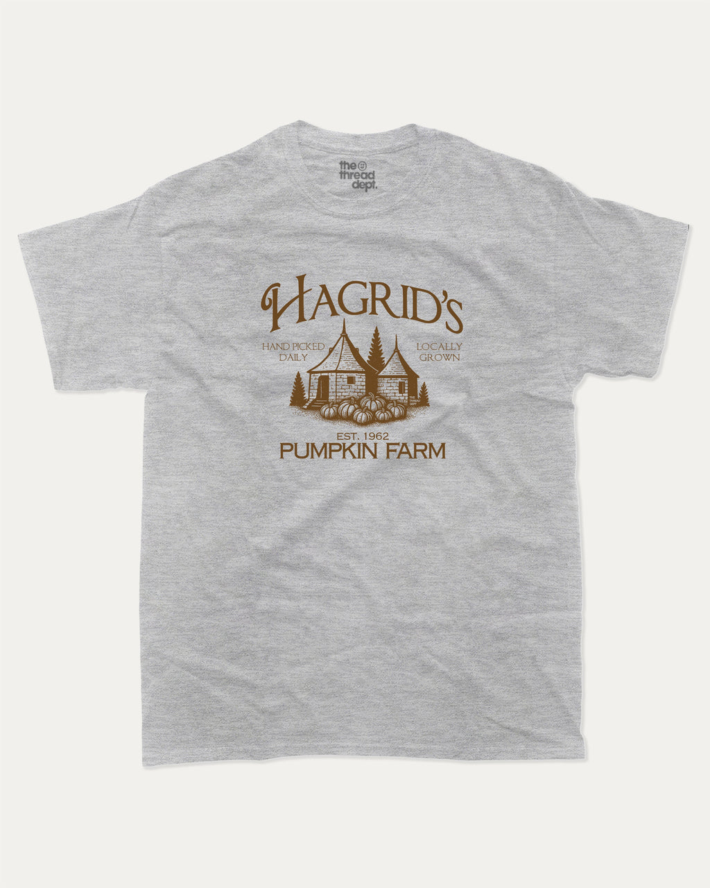 Hagrid's Pumpkin Farm graphic t-shirt, perfect halloween gift for friends. Vintage halloween tee, halloween graphic shirt, unique gift idea. Heather Grey.