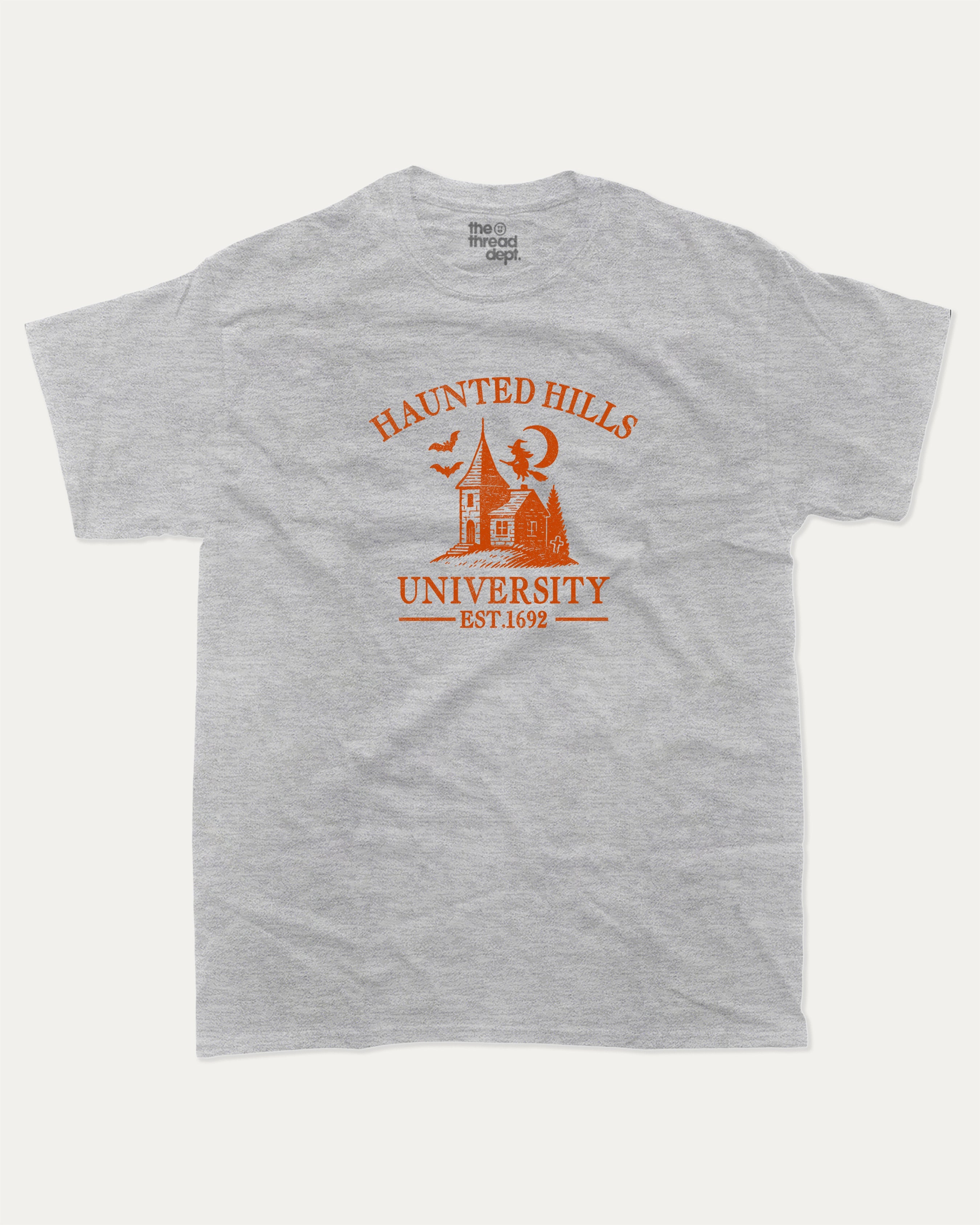 Haunted Hills University graphic tee with bold and humorous print, Halloween Graphic T shirt, Spooky T shirt, Perfect Gift for Halloween Day, funny and trendy graphic. Perfect for adults and gift-giving. Heather Grey shirt.