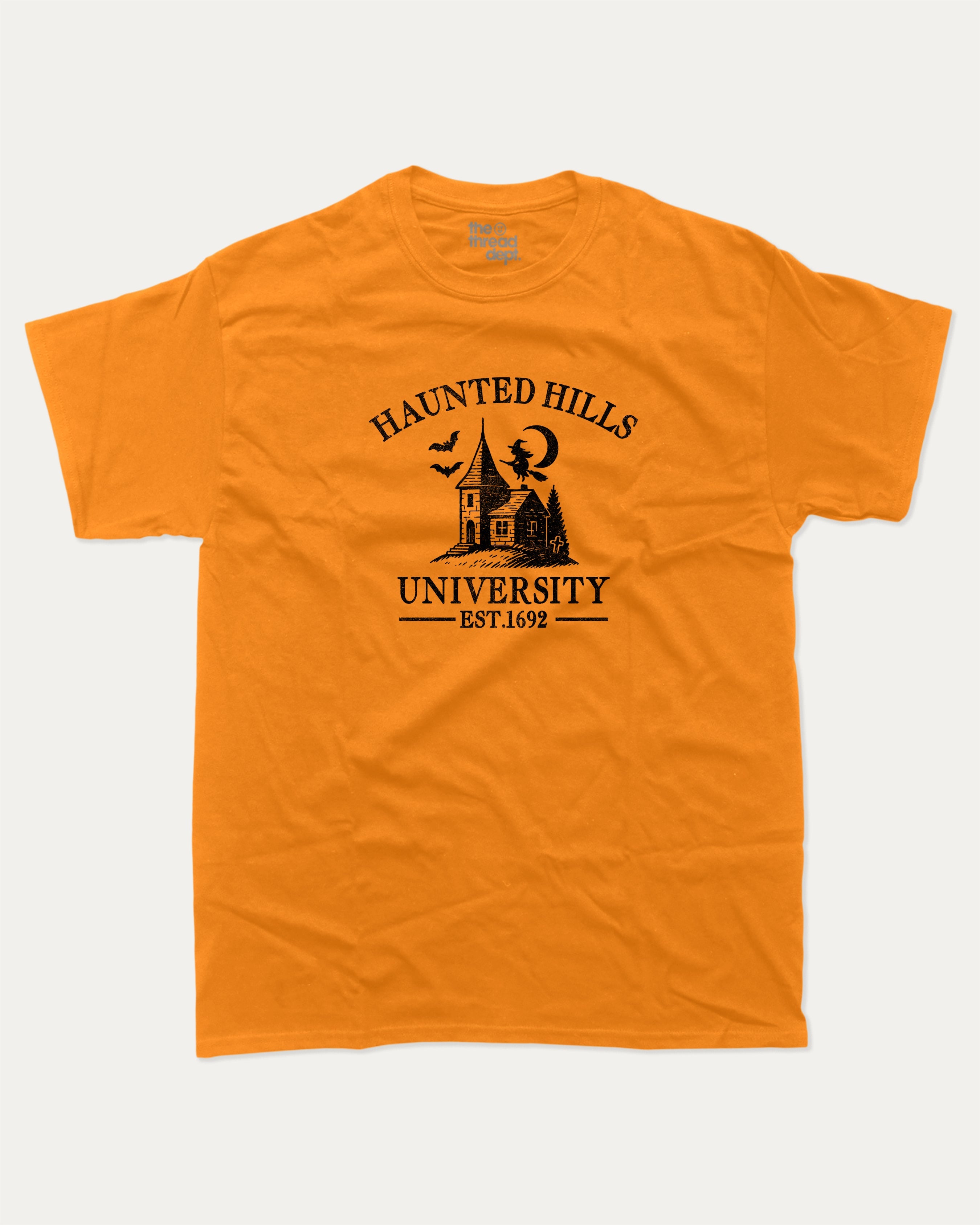 Haunted Hills University graphic tee with bold and humorous print, Halloween Graphic T shirt, Spooky T shirt, Perfect Gift for Halloween Day, funny and trendy graphic. Perfect for adults and gift-giving. Orange shirt.