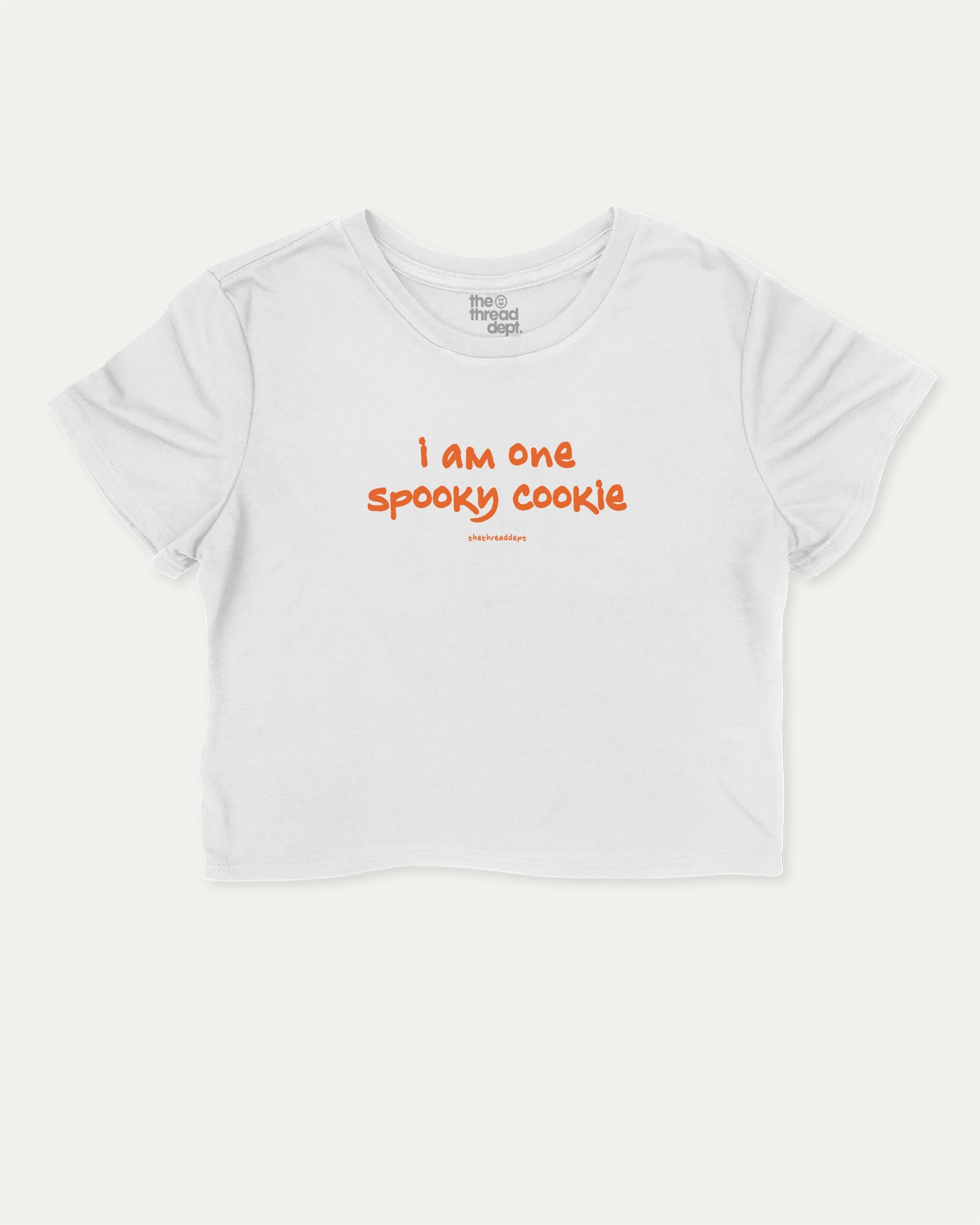 I am one spooky cookie graphic crop tee with funny and trendy slogan print, Halloween Graphic T shirt, Spooky T shirt, Perfect Gift for Halloween Day, perfect for women’s casual looks or layering. White crop t-shirt.