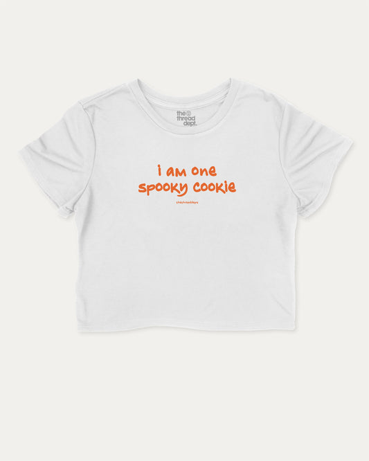 I am one spooky cookie graphic crop tee with funny and trendy slogan print, Halloween Graphic T shirt, Spooky T shirt, Perfect Gift for Halloween Day, perfect for women’s casual looks or layering. White crop t-shirt.