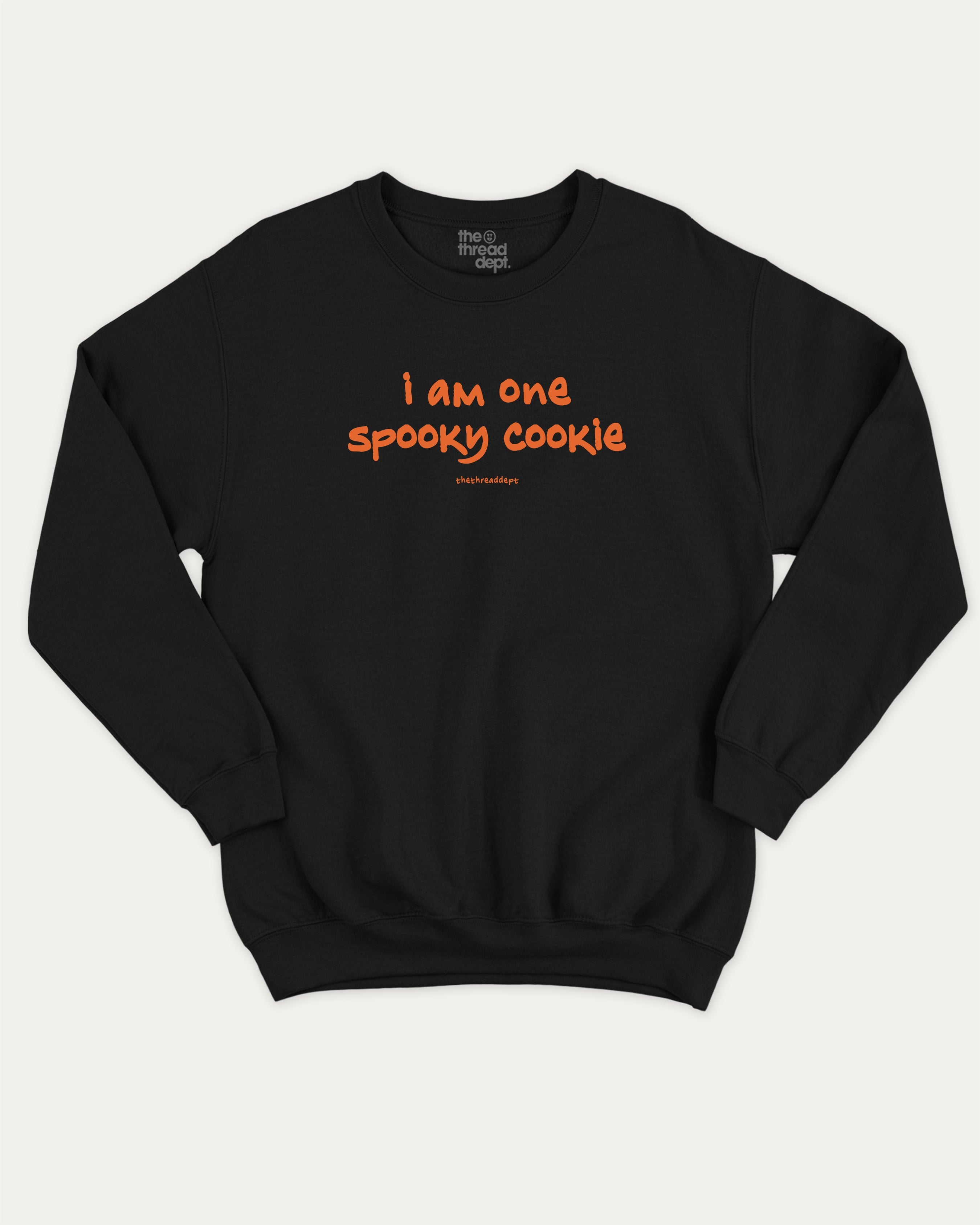 I am one spooky cookie graphic sweatshirt with bold and humorous print, Halloween Graphic T shirt, Spooky T shirt, Perfect Gift for Halloween Day, warm and cozy graphic for everyday wear. Perfect for adults and gift-giving. Black pullover.