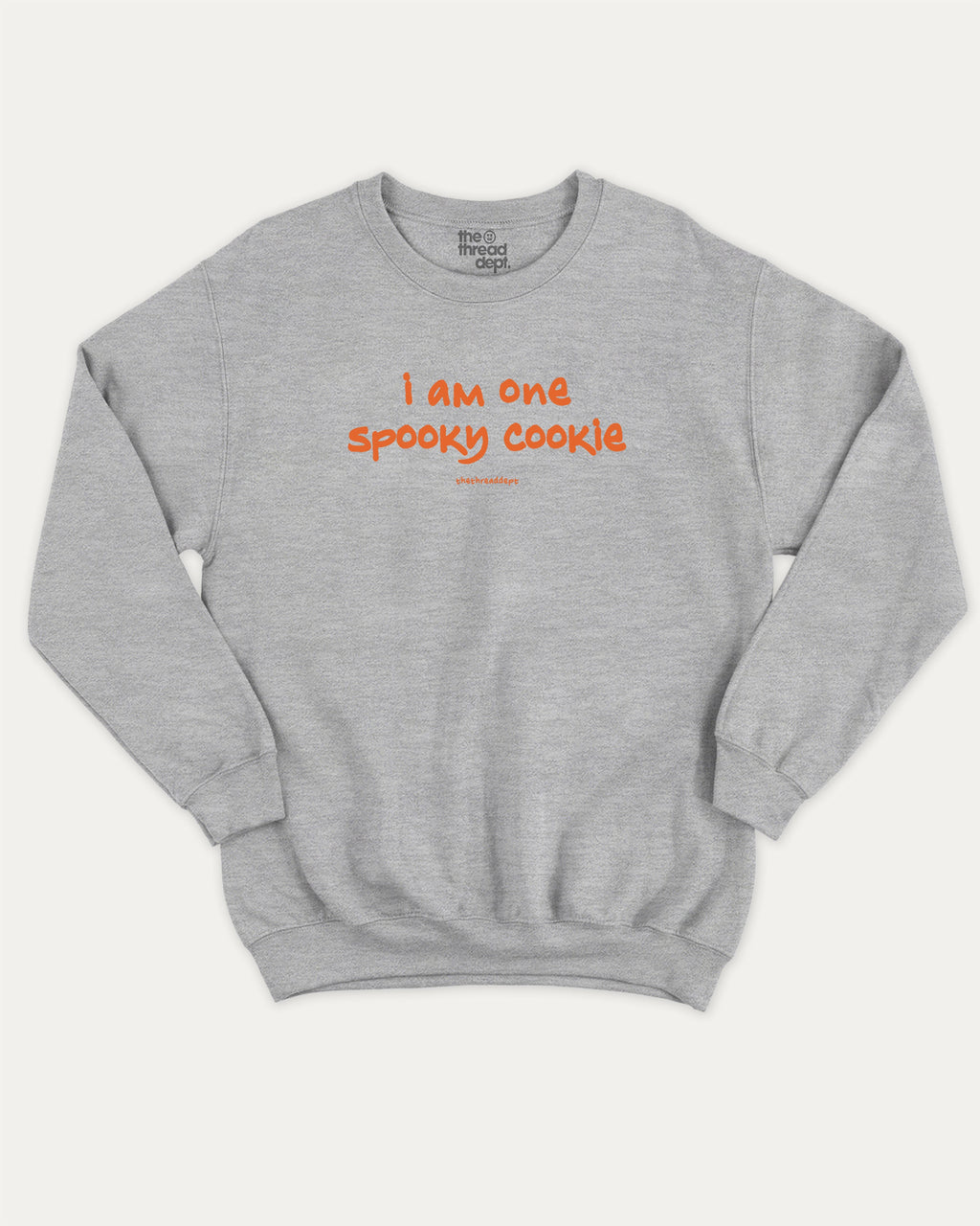 I am one spooky cookie graphic sweatshirt with bold and humorous print, Halloween Graphic T shirt, Spooky T shirt, Perfect Gift for Halloween Day, warm and cozy graphic for everyday wear. Perfect for adults and gift-giving. Heather Grey pullover.
